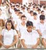 Students in Ecuador practice Transcendental Meditation in a large group